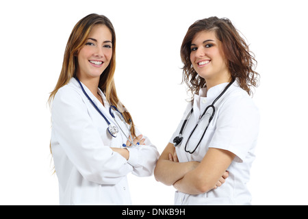 Doctor woman and nurse posing looking at camera isolated on a white background Stock Photo