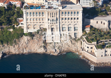 AERIAL VIEW. Historic oceanographic museum standing on the edge of a clifftop. Monaco-Ville district, Principality of Monaco. Stock Photo