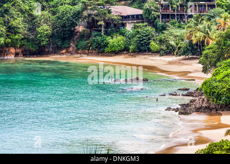 Beach, rocks and bay of Caribbean island village of Castara, Tobago, Republic of Trinidad and Tobago West Indies Stock Photo