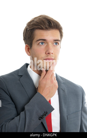 young businessman lost in thought Stock Photo
