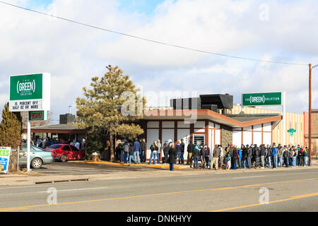 Denver, Colorado USA – 01 January 2014.  Crowds continue to flock to retail marijuana dispensaries throughout the day.  Wait times at The Green Solution in Denver are over three hours. Credit:  Ed Endicott/Alamy Live News Stock Photo