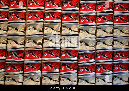 Converse sneakers laid out in the pattern of an American flag at the Converse store on Broadway in Greenwich Village, New York City. Stock Photo
