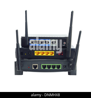 Stack Of Wireless Routers On White Background Stock Photo