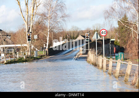 Yalding, Kent, UK. 2nd January 2014. The Environment Agency has issued a flood warning for Yalding Village in County of Kent the first one for 2014 on Thursday 2nd January. View of Hampstead road over the river Medway and Twyford Bridge , now a river itself Credit:  Yon Marsh/Alamy Live News Stock Photo