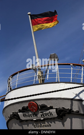 Stralsund, Germany, German national flag flies at the stern of the sailing school ship Gorch Fock I Stock Photo
