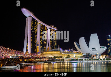 Singapore, night view of Marina Bay Sands, Art Science Museum and the Helix Bridge Stock Photo