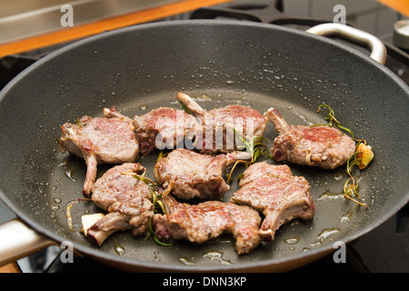 Lamb racks in a pan Stock Photo