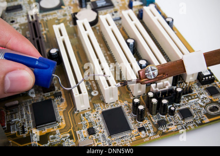 Repairing PC motherboard Stock Photo