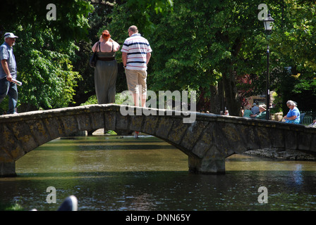 waterside fun in Bourton on the Water, Cotswolds UK Stock Photo