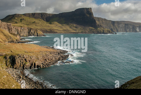 Moonen Bay at Neist Point in Duirnish, the most westerly point on the Isle of Skye. The prominent feature is Waterstein Head Stock Photo