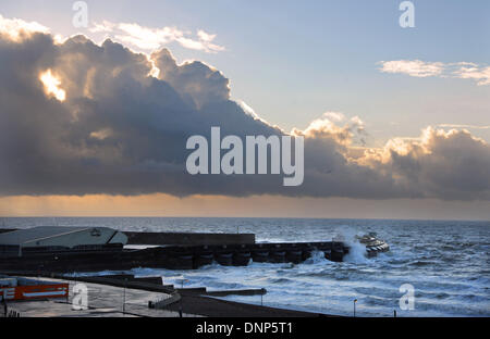 Storm clouds mixed with patches of blue sky over Brighton Marina this morning Stock Photo