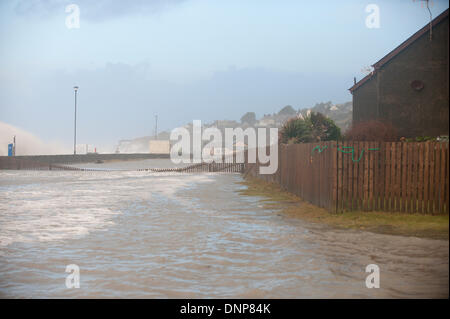 Barmouth, Gwynedd, Wales, UK. 3rd January 2014. With over 500 flood warnings and alerts nationwide The Environment Agency has warned people to be prepared to protect themselves and their homes and to stay well back from high water mark on coastlines. Credit:  Graham M. Lawrence/Alamy Live News. Stock Photo