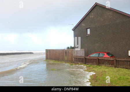 Barmouth, Gwynedd, Wales, UK. 3rd January 2014. With over 500 flood warnings and alerts nationwide The Environment Agency has warned people to be prepared to protect themselves and their homes and to stay well back from high water mark on coastlines. Credit:  Graham M. Lawrence/Alamy Live News. Stock Photo