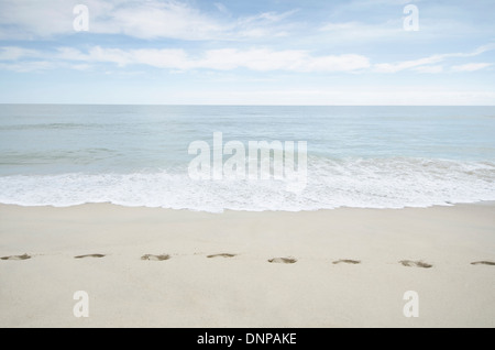 USA, Massachusetts, Nantucket, Foorprints on beach Stock Photo