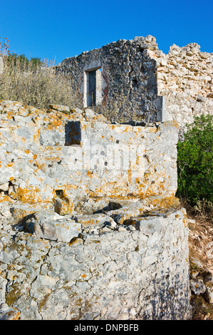 Ruins of buildings destroyed by 1953 earthquake in Andipata Erisou near Fiscardo, Kefalonia, Greece Stock Photo