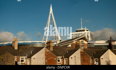 A view from the train of the Millennium Stadium and British Telecom BT building over house roofs Cardiff Wales UK  KATHY DEWITT Stock Photo