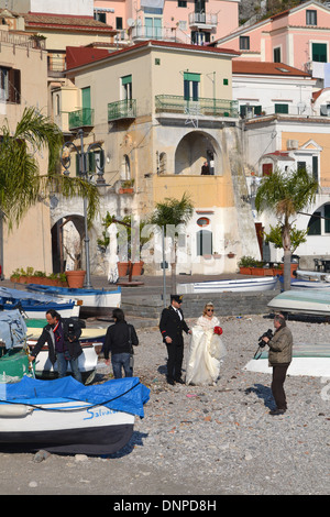 Wedding photographs on Cetara village on the Amalfi coast. Couple in traditional dress. Stock Photo