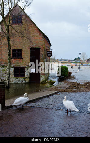 Christchurch, Dorset, UK. 03rd Jan, 2014. Place Mill now an art gallery on Christchurch Quay flooded after heavy rain causes River Stour to break its banks and made worse by high spring tide Credit:  Roger Allen Photography/Alamy Live News Stock Photo