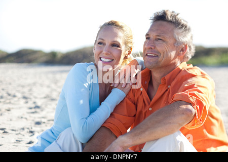 Mature Couple Sitting on Beach, Jupiter, Palm Beach County, Florida, USA Stock Photo