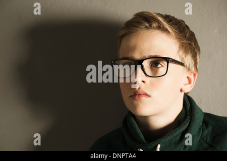 Head and Shoulders Portrait of Boy, Studio Shot Stock Photo