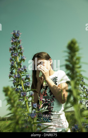 Girl having Allergic Reaction to Plants, Mannheim, Baden-Wurttemberg, Germany Stock Photo