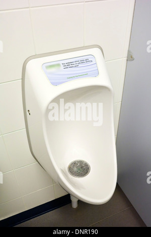 Waterless urinal bowl installed in a leading UK retail company shopping store (company name removed) Stock Photo