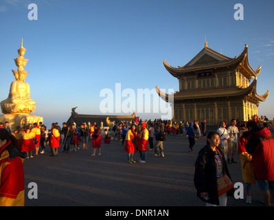 Sunrise dawn temples at the Golden summit of Mount Emei, Emei Shan, near Leshan, Sichuan province, China. Stock Photo