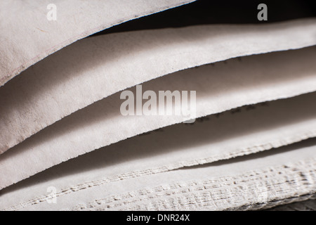 Pile of newspapers close up macro shot Stock Photo