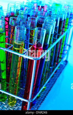 closeup of a pile of test tubes with liquids of different colors Stock Photo