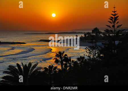 Sunset at the Nissi Beach in Ayia Napa, Cyprus. Stock Photo