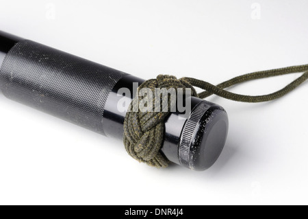 Here is a Maglite torch body with a homemade Turks head knotted lanyard. Stock Photo