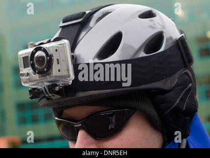 Hanover, Germany. 04th Jan, 2014. ILLUSTRATION - An illustration shows a man wearing a ski hemlet with with GoPro brand camera attached to it in Hanover, Germany, 04 January 2014. The camera, which can be worn on the helmet, can make high-resolution videos and photos. Photo: JULIAN STRATENSCHULTE/dpa/Alamy Live News Stock Photo