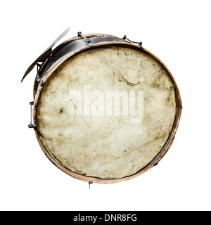 The old, worldly-wise, shabby, dusty bass drum for a wind band and a beater Stock Photo