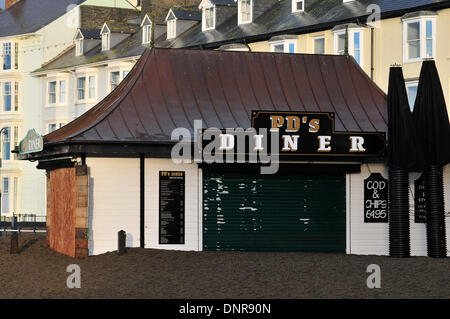 Aberystwyth, Wales, UK - Storm damage on the Promenade in Aberystwyth, west Wales, after the latest gales and storm surge - January 4th 2014. Photo credit: John Gilbey/Alamy Live News. Stock Photo