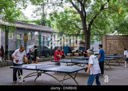 People Playing Table Tennis in a Park, Bejing, China Stock Photo