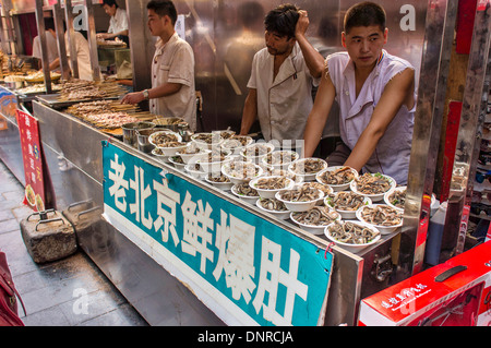 Vendor of Beef and Lamb Tripe in Wangfujing Street in Bejing, China Stock Photo