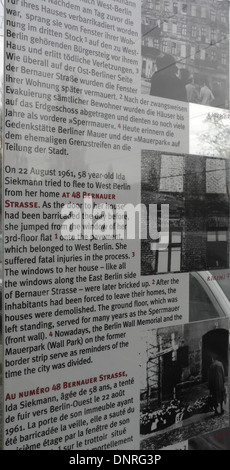 Perspex information panel with monochrome photographs, Ida Siekmann Memorial, Berlin Wall, location of Bernauer Strasse 48 Stock Photo