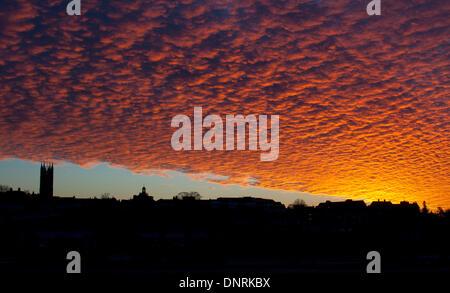 Warwick, Warwickshire, UK. 5th Jan, 2014. A dramatic dawn sky over Warwick town centre. The clear sky came after days of stormy weather across the UK. Credit:  Colin Underhill/Alamy Live News Stock Photo