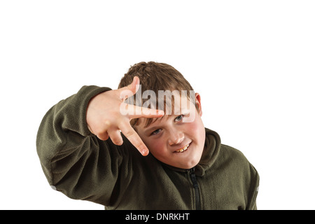 A 10 year old boy trying to be cool in the Uk Stock Photo