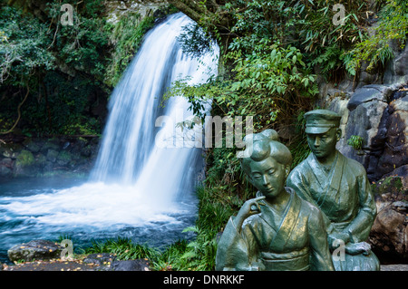 Stone Statue of the Story of 'The Izu Dancer' and Shokeidaru Waterfall, Shizuoka Prefecture, Japan Stock Photo