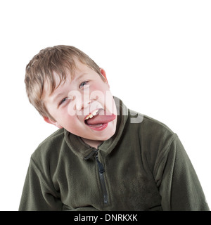 A 10 year old boy sticking his tongue out in the Uk Stock Photo