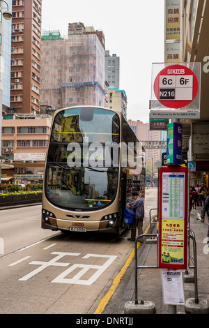 Double-decker Bus Running on the Street of Tsim Sha Tsui, Kowloon, Hong Kong, China Stock Photo