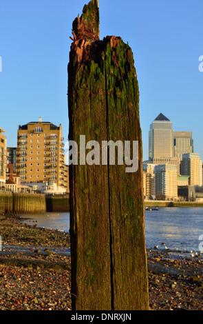 Old timbers on the beach, Limehouse, London, United Kingdom Stock Photo