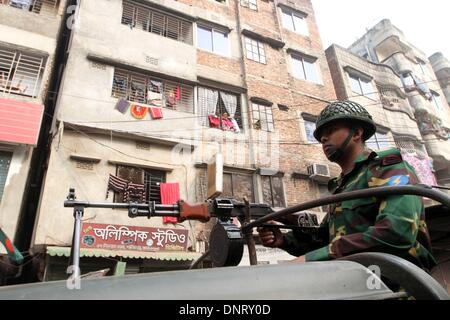 Dhaka, Bangladesh. 5th Jan, 2014. Police cordon off the office of ...