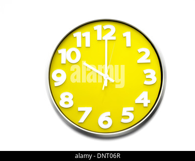 yellow clock face 10 o'clock the clock strikes ten 22.00 hours Stock Photo