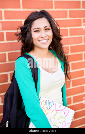 Beautiful young student in campus Stock Photo