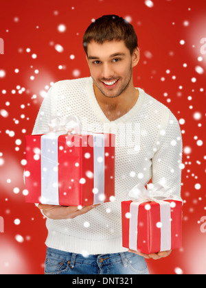 man holding many gift boxes Stock Photo