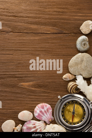 seashell and compass on wood background Stock Photo - Alamy