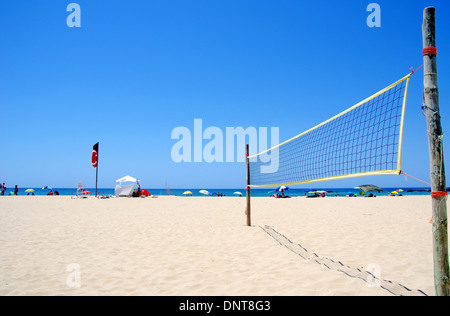 Beach Volleyball net on sandy beach at Portugal Stock Photo