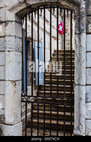 Wrought iron gate barring entry to the rear entrance of City Hall in Geneva Stock Photo